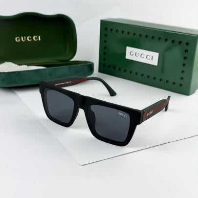 Black square sunglasses with dark lenses and Gucci logo on temples