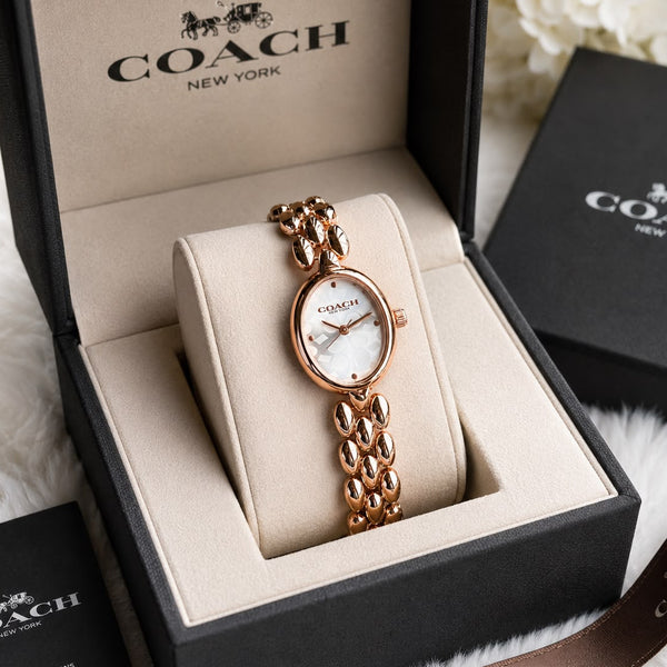 Elegant rose gold oval bracelet watch for women with a white patterned dial, jewellery-inspired stainless steel bracelet, and mineral glass.
