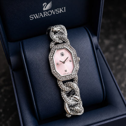 Elegant silver ladies watch with crystal-studded bracelet, pink dial, and sparkling bezel in a luxury presentation box.