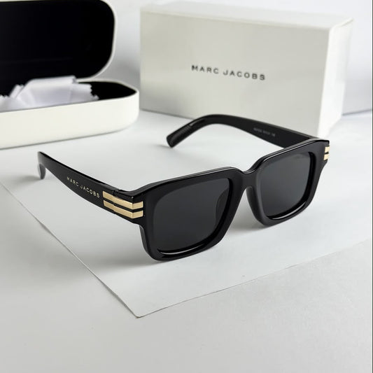Marc Jacobs black square sunglasses with dark tinted lenses, glossy frame, gold-tone temple accents and branded arms