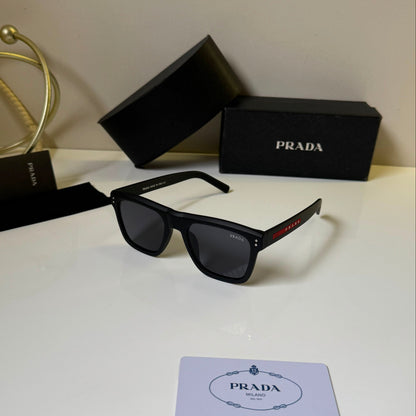 Matte black square sunglasses with dark UV-protective lenses, lightweight frame
