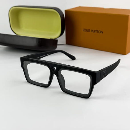 Premium black rectangular blue light blocking eyeglasses with oversized geometric frame and clear lenses displayed on a white surface.