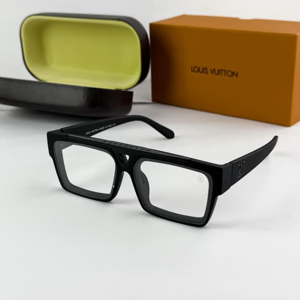 Premium black rectangular blue light blocking eyeglasses with oversized geometric frame and clear lenses displayed on a white surface.