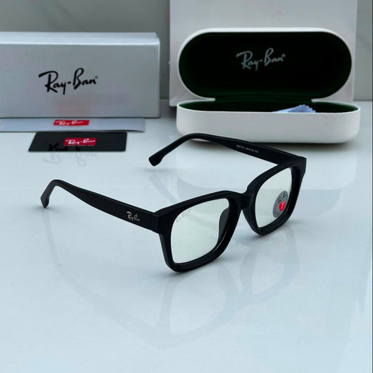 Premium matte black square blue light blocking eyeglasses with clear lenses displayed alongside protective case and accessories on a white surface.