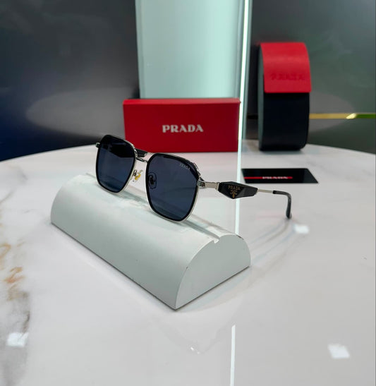 square sunglasses on display, black frame with dark lenses and metal arms