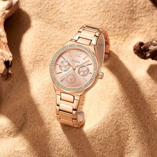 Rose gold-tone chronograph watch with blush dial, diamond bezel, link bracelet