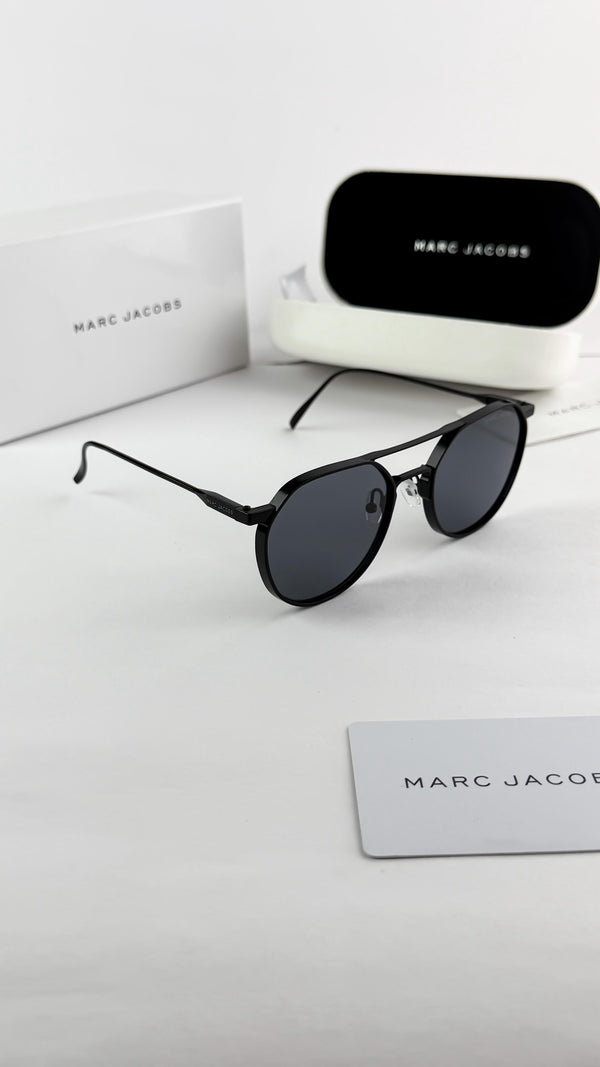 Men's round sunglasses with black metal frame and dark lenses, with black case