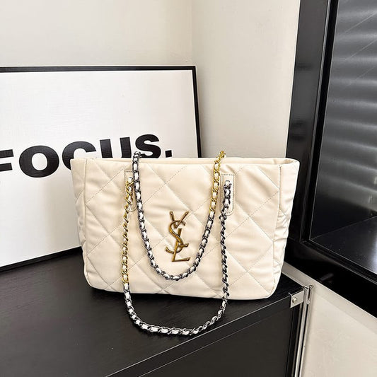 Cream quilted tote bag with YSL logo plaque and gold/silver chain handles