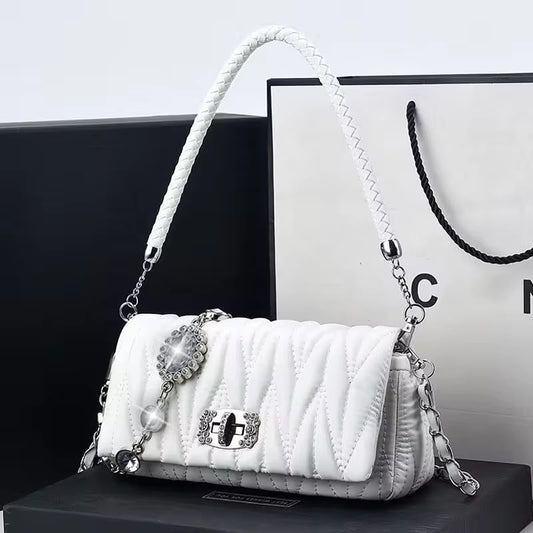 Premium quilted women's shoulder bag with braided top handle, crystal chain detailing, detachable shoulder strap, available in pearl white, ivory beige