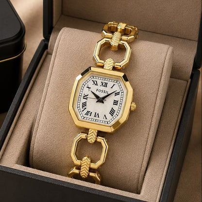 Women’s gold-tone octagonal watch with white Roman numeral dial and open-link metal bracelet